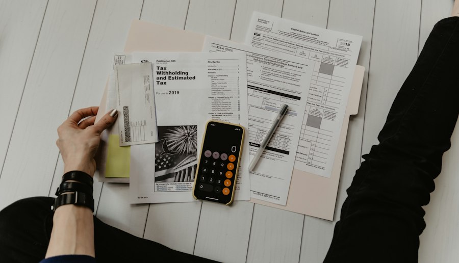 Organized financial paperwork and calculator